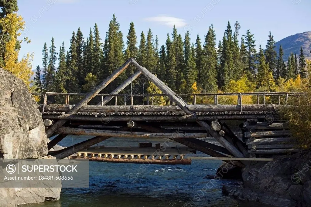 Historic wooden bridge across old Alaska Highway, Aishihik River, Otter Falls, Yukon Territory, Canada