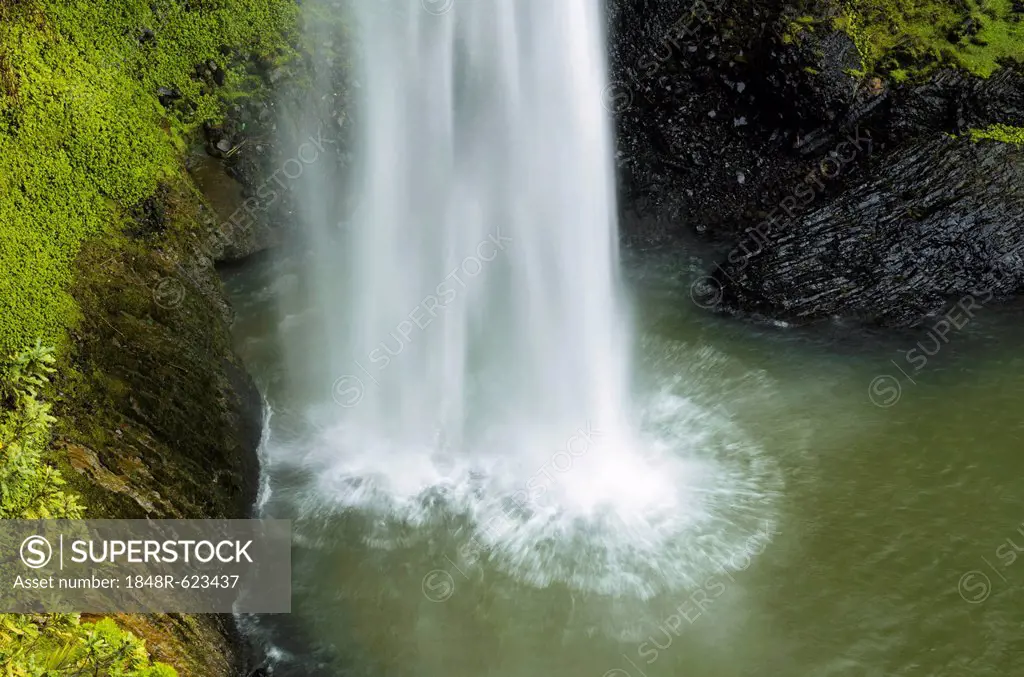 Surge of water falling into a lake, Bridal Veil Falls, Raglan, Waikato, North Island, New Zealand