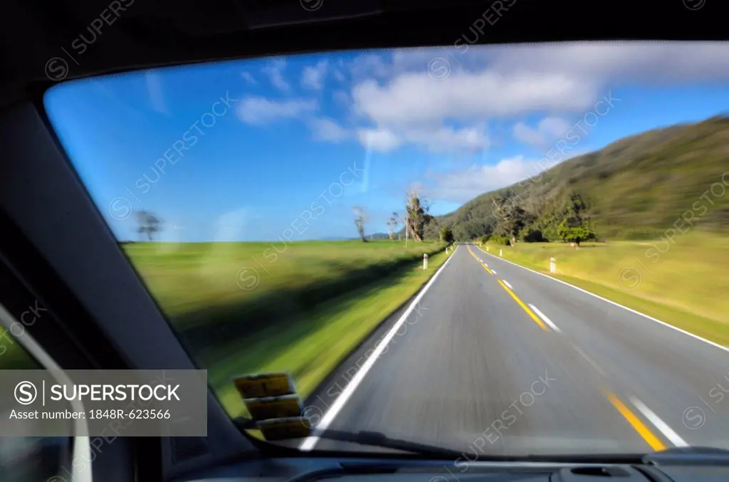 Driving on the left, view from inside a car on the road, driving fast, West Coast, New Zealand, Oceania