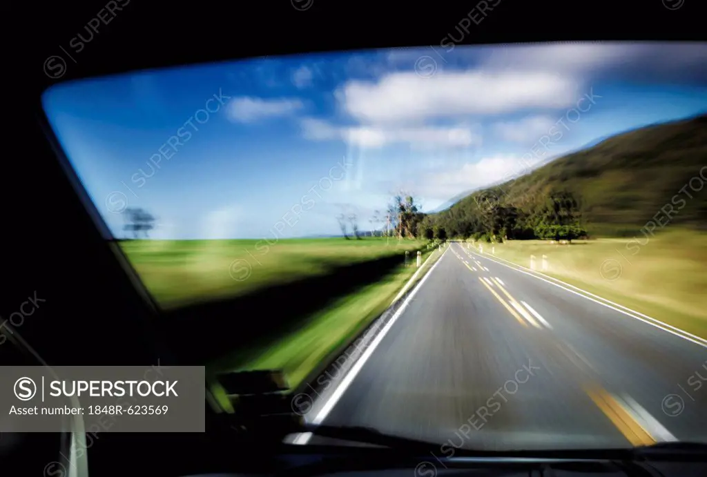 Driving under the influence of alcohol, driving on the left, view from inside a car on the road, driving fast, West Coast, New Zealand, Oceania