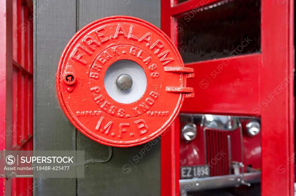Historic fire alarm, old fire engine at back