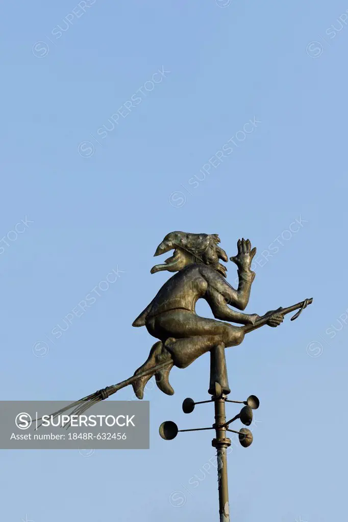 Weather vane, witch riding a broom