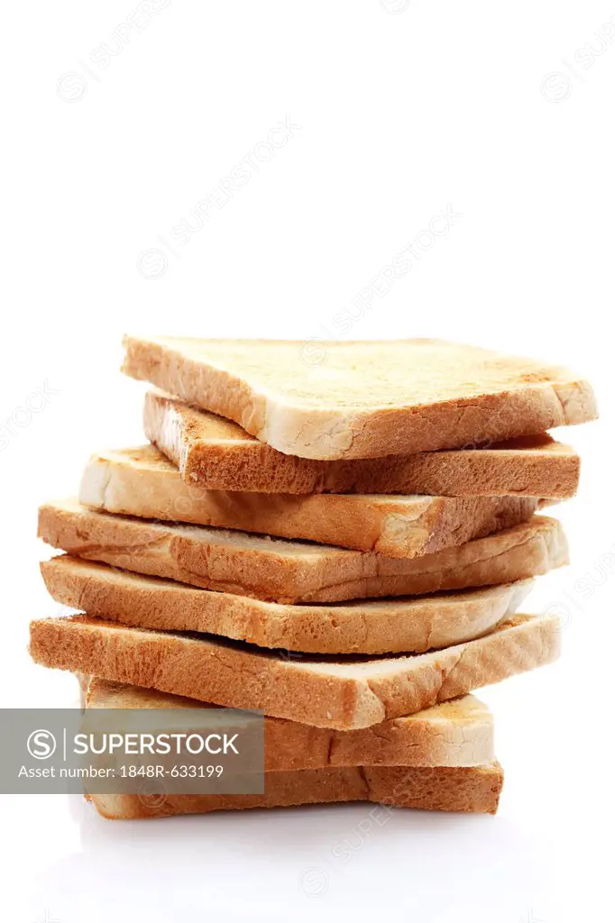 Stacked slices of toast, toasted slices of bread
