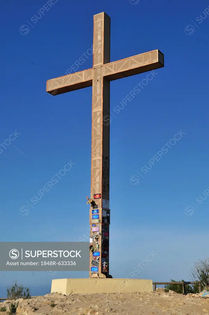 Huge wooden cross on a hill overlooking Benidorm, Costa Blanca, Spain, Europe