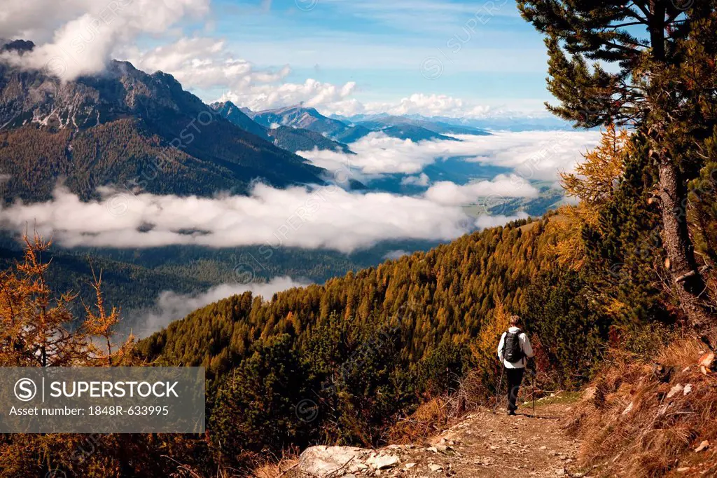 Woman hiking in Drei Zinnen, Tre Cime di Lavaredo area in Dolomite Alps, Southtirol, Italy, Europe