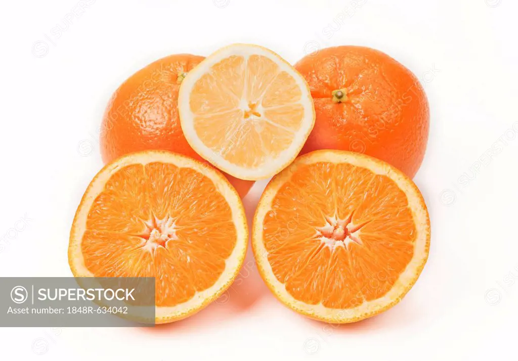 Fresh sliced oranges and a half lemon