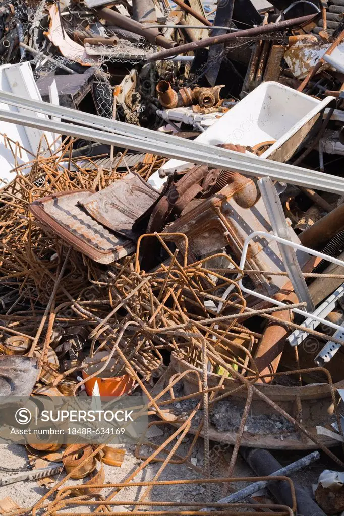 Pile of discarded industrial items at a scrap metal recycling centre, Quebec, Canada