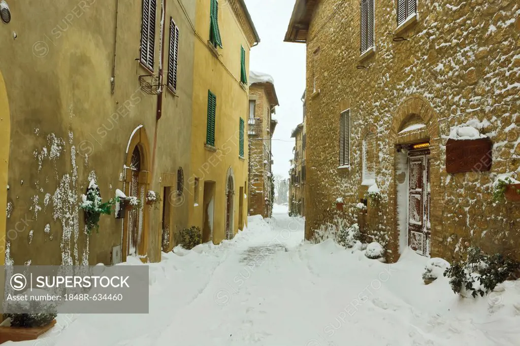 Snow-covered road in Pienza, Tuscany, Italy, Europe