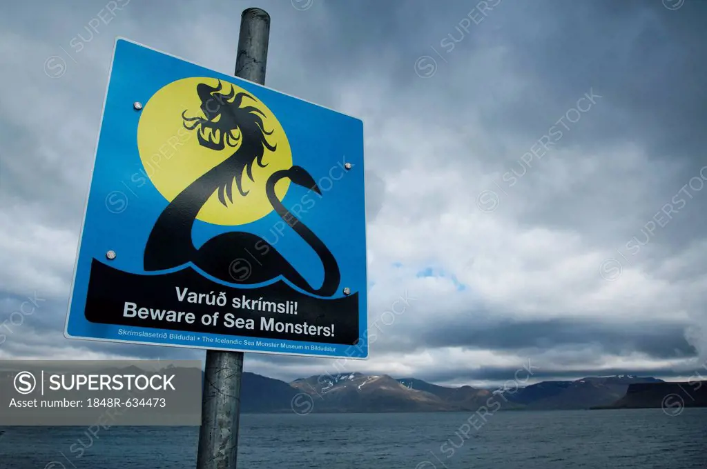 Street sign, Beware of Sea Monsters, near the town of Þingeyri, Thingeyri, Dýrafjoerður fjord, Westfjords, Iceland, Europe