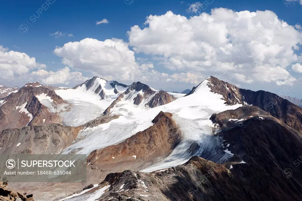 View ascending Finailspitz Mountain in the Schnalstal Valley through Tisental Valley, with Similaun Mountain and Hintere Schwaerze Mountain at the rea...