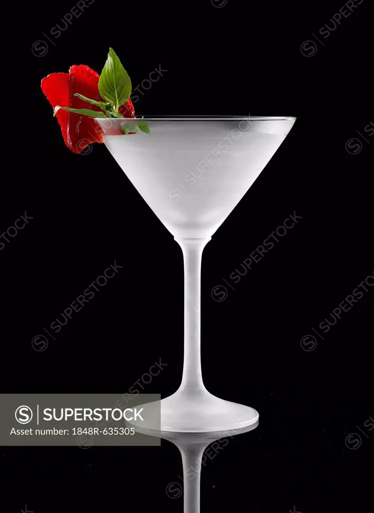 Frosted cocktail glass with a strawberry piece