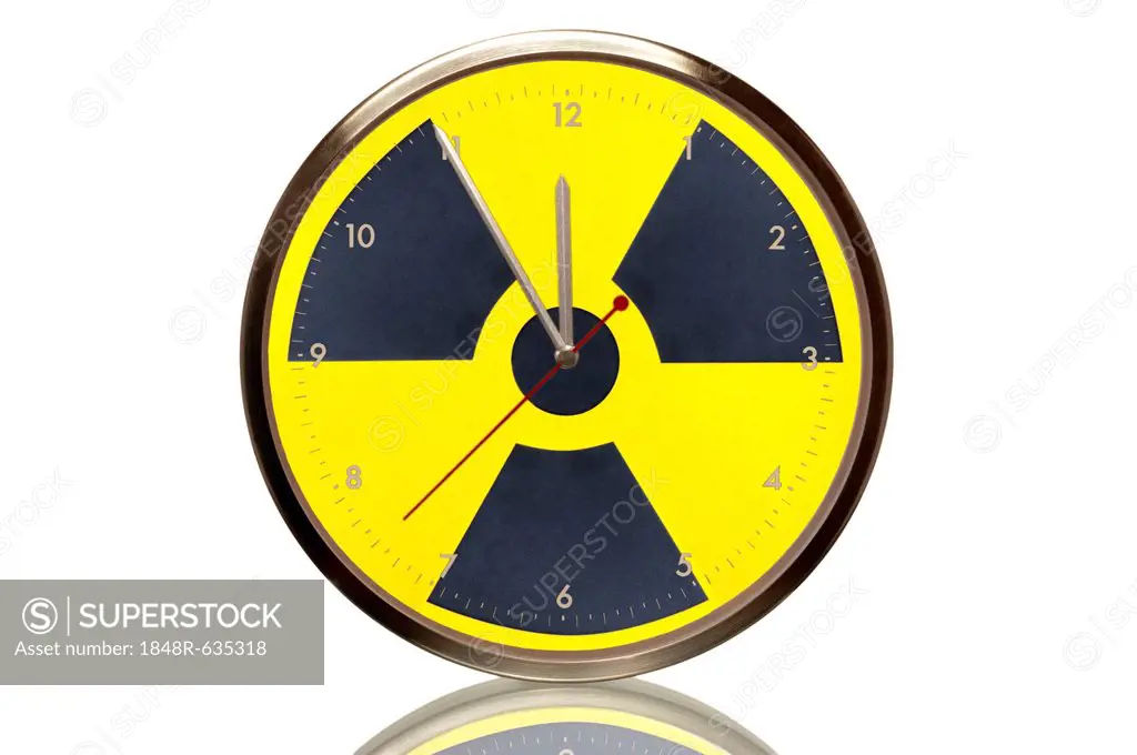 Clock with the nuclear symbol, 5 minutes to twelve, eleventh hour, symbolic image for nuclear power phase-out