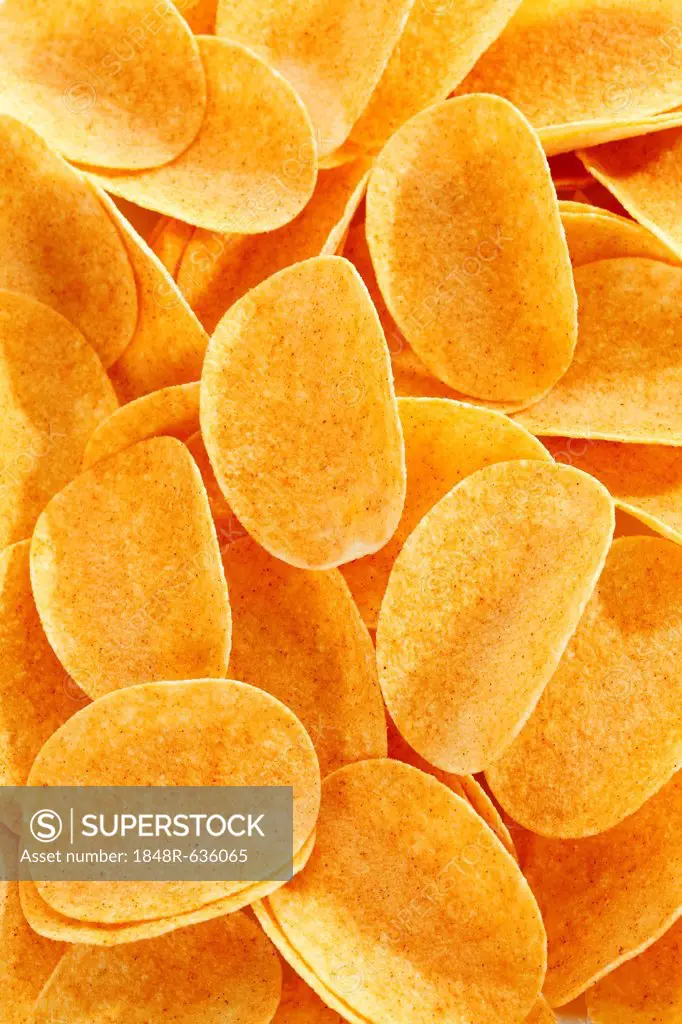 Oval paprika potato chips, stacking chips, full-frame