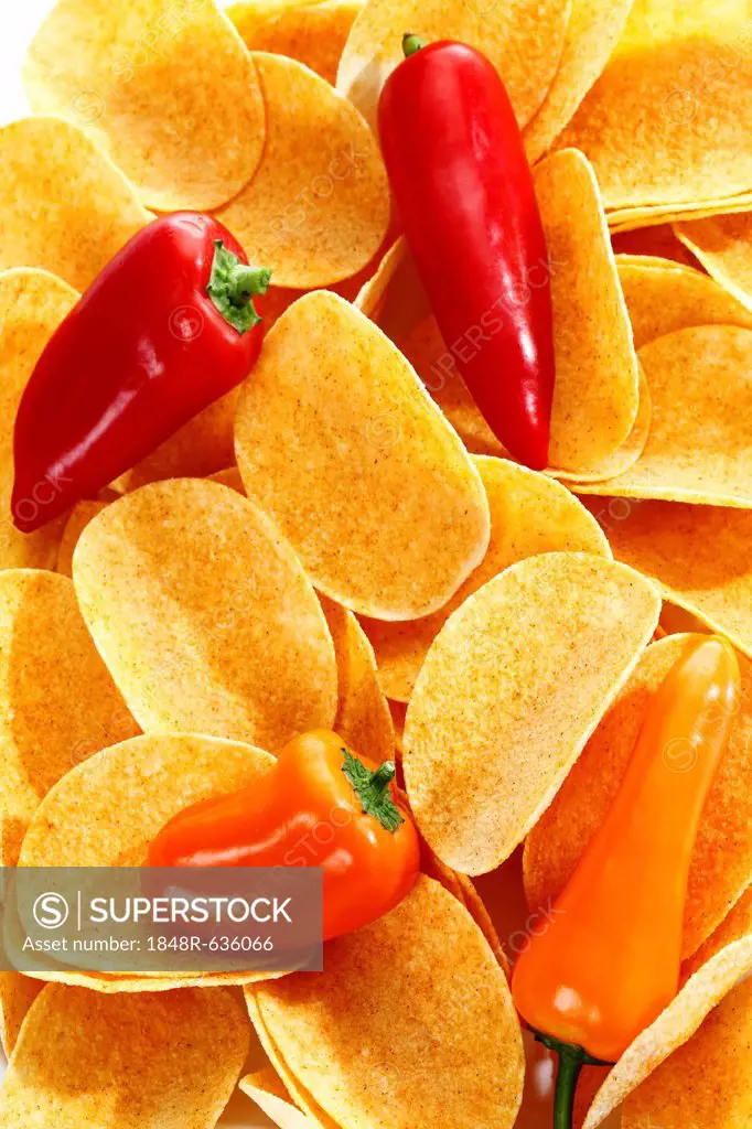 Oval paprika potato chips, stacking chips, with sweet peppers, full-frame