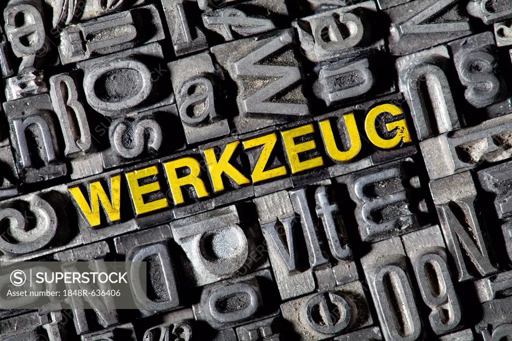Old lead letters forming the word Werkzeug, German for tools