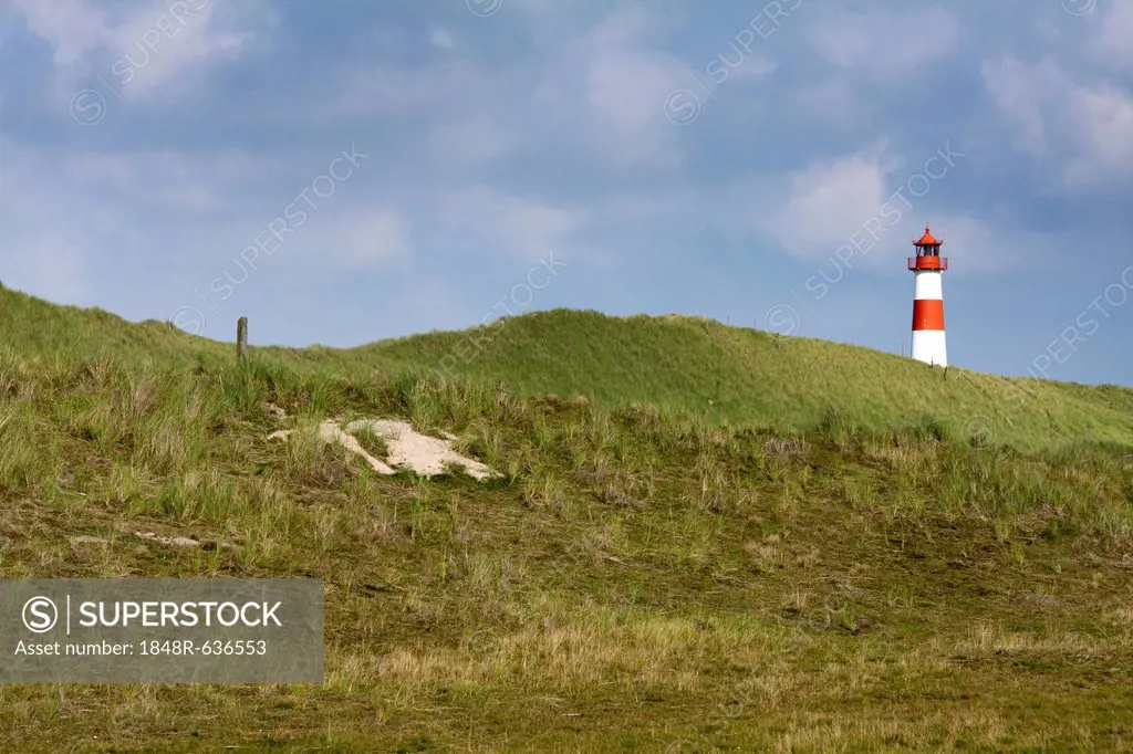 Red and white striped lighthouse of List Ost on the Sylt peninsula of Ellenbogen, List, Sylt, North Frisia, Schleswig-Holstein, Germany, Europe, Publi...