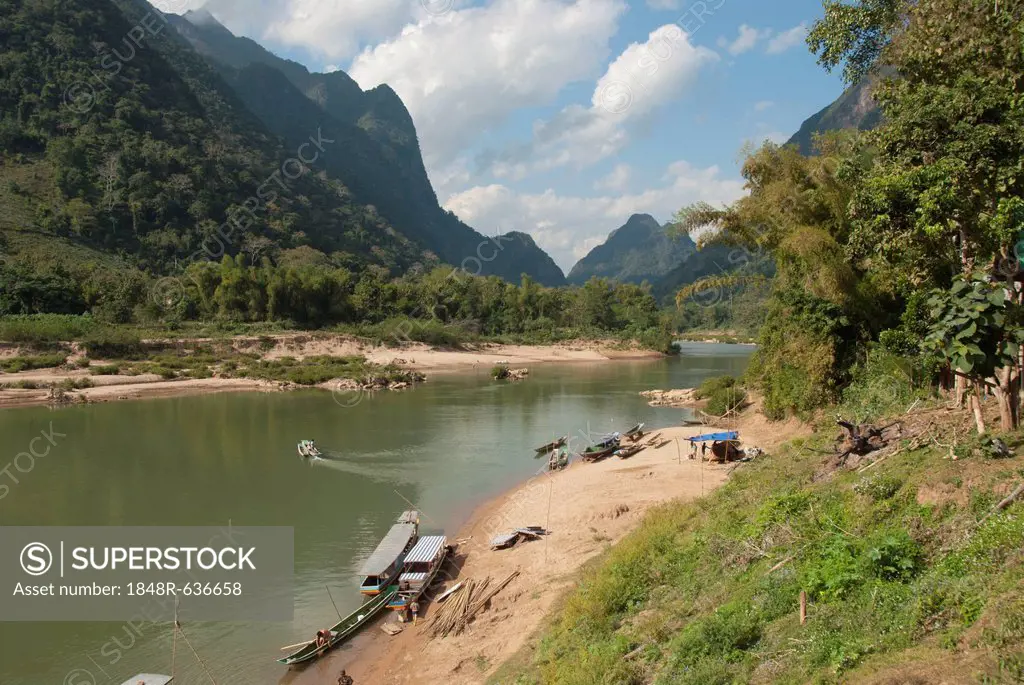 River landscape, boats on the shore, Nam Ou river, Muang Ngoi Kao, Luang Prabang province, Laos, Southeast Asia, Asia