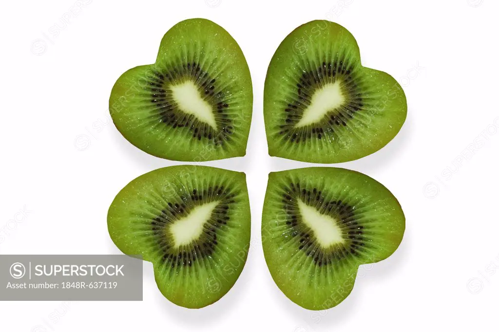 Heart-shaped slices of kiwi fruit arranged like a cloverleaf