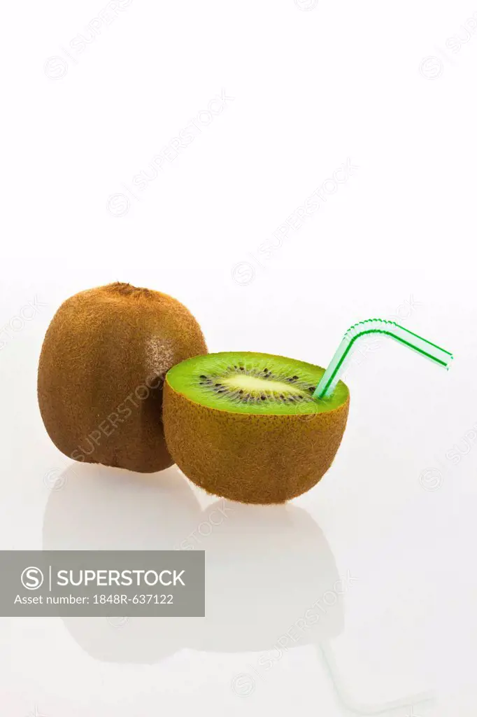 Kiwi fruits, kiwi fruit with a drinking straw as a soft drink