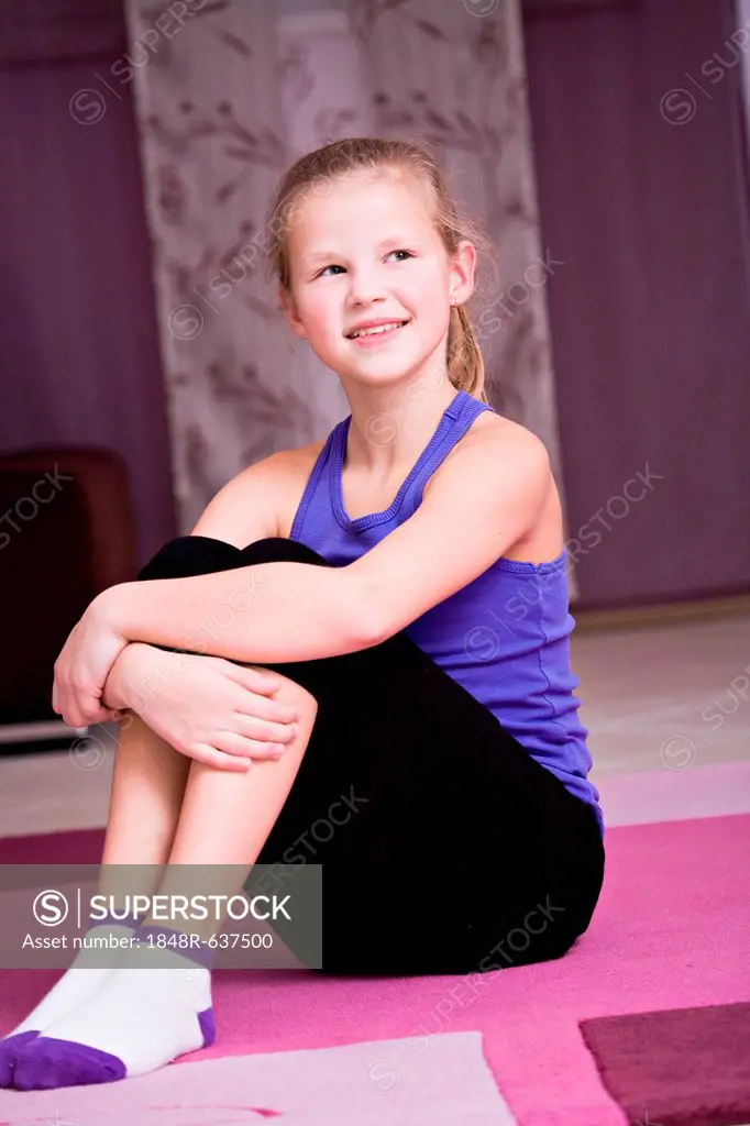 Girl, 11, doing gymnastics