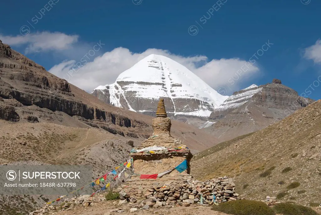 Tibetan Buddhism, ancient stupa, snow-capped sacred Mount Kailash, or Gang Rinpoche, southside with a gutter, pilgrims trail near the Selung Gompa Mon...