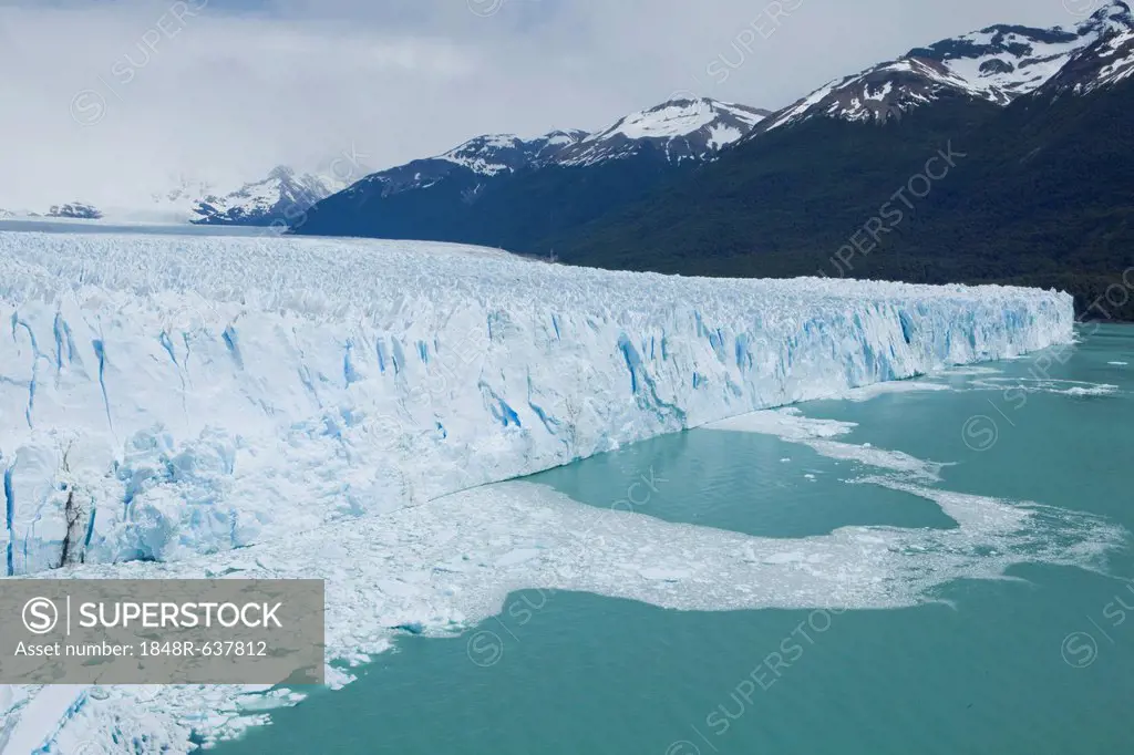 Glacial ice from the Perito Moreno Glacier calving into the lake of Lago Argentino, Santa Cruz region, Patagonia, Argentina, South America, America