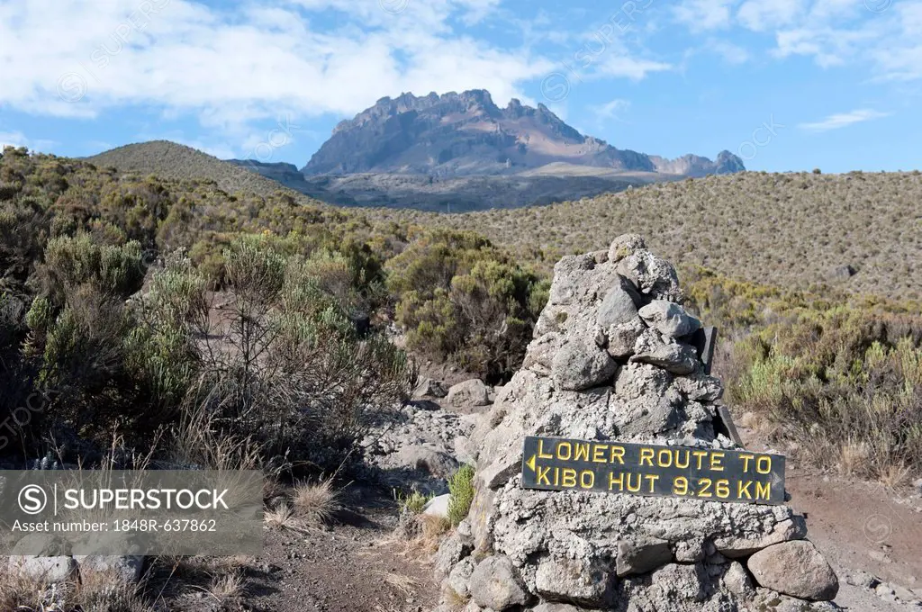 Trekking, sign, route to Kibo Hut, near the Horombo Huts, Mt Mawenzi at back, Marangu Route, Mt. Kilimanjaro, Tanzania, East Africa, Africa