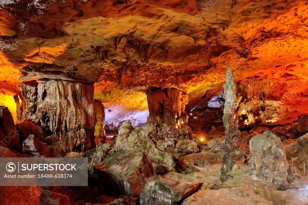 Colourfully, illuminated Hang Sung Sot cave, Surprise Cave, Cave of Awe, a UNESCO World Heritage Site, stalactite cave in Halong Bay, Vietnam, Southea...