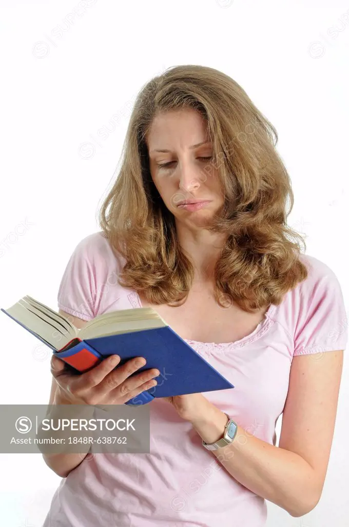 Young woman reading a book