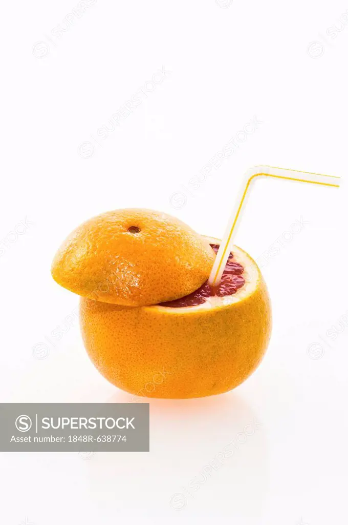 Grapefruit with a straw as a drink