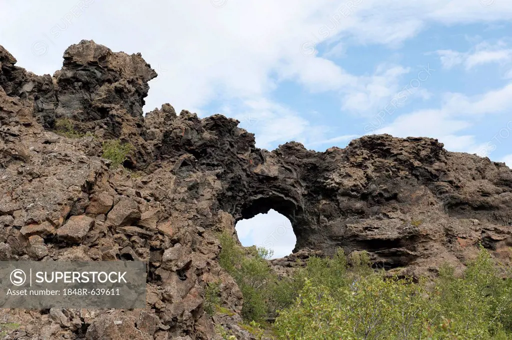 Volcanism, cooled lava field, round hole in rocks, strangely shaped rock formations, Dimmuborgir, Lake Myvatn region, Myvatn, Iceland, Scandinavia, No...