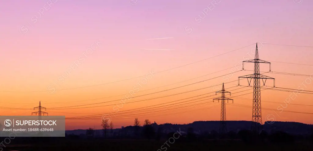 Power poles, evening sky