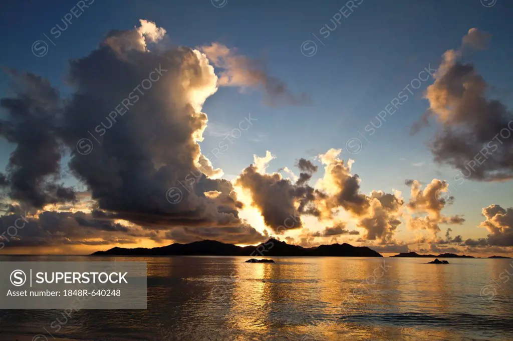 Cloudy sky at sunset behind Praslin island, Seychelles, Africa, Indian Ocean