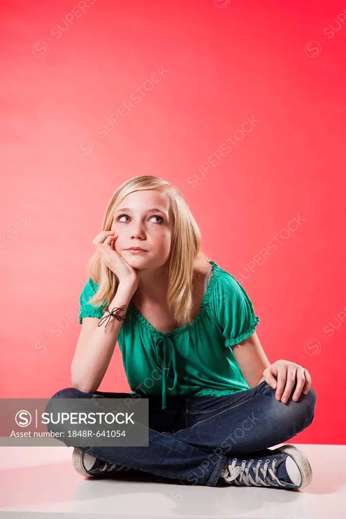 Girl sitting cross-legged
