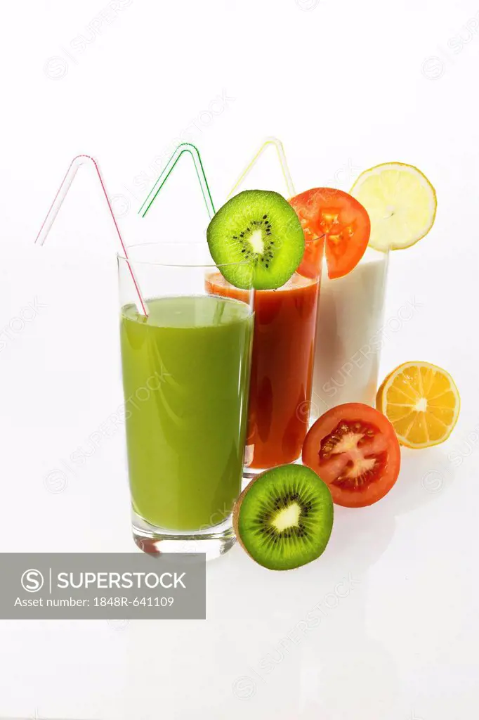 Kiwi and lemon yogurt drinks and tomato juice in glasses with fruit
