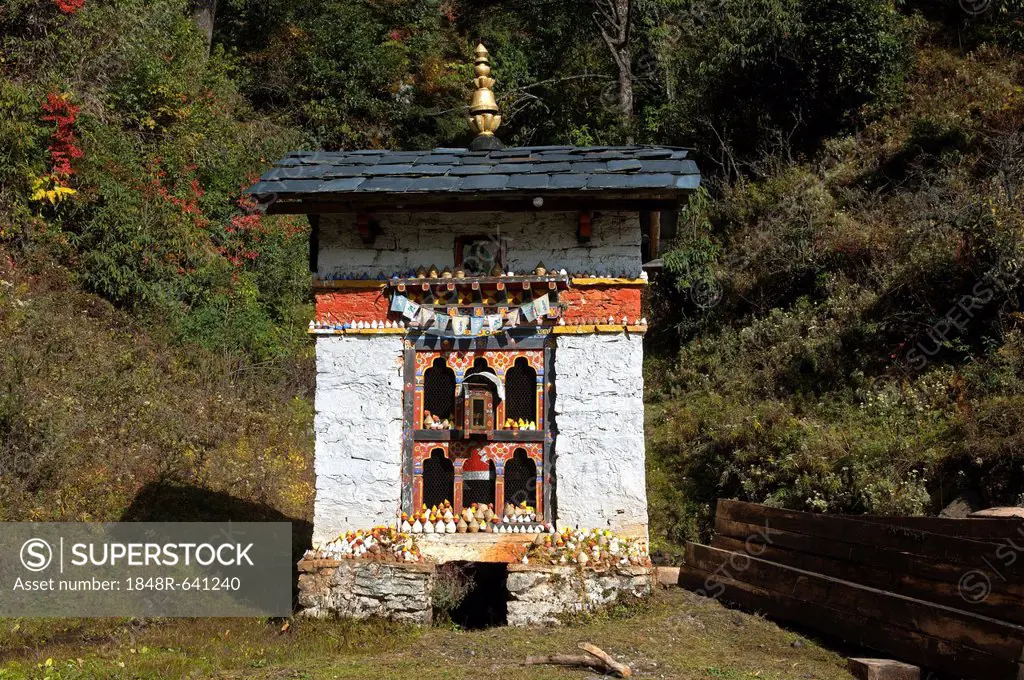 Small shelter for a Buddhist prayer wheel at the entrance to Dochula Pass, Bhutan, South Asia