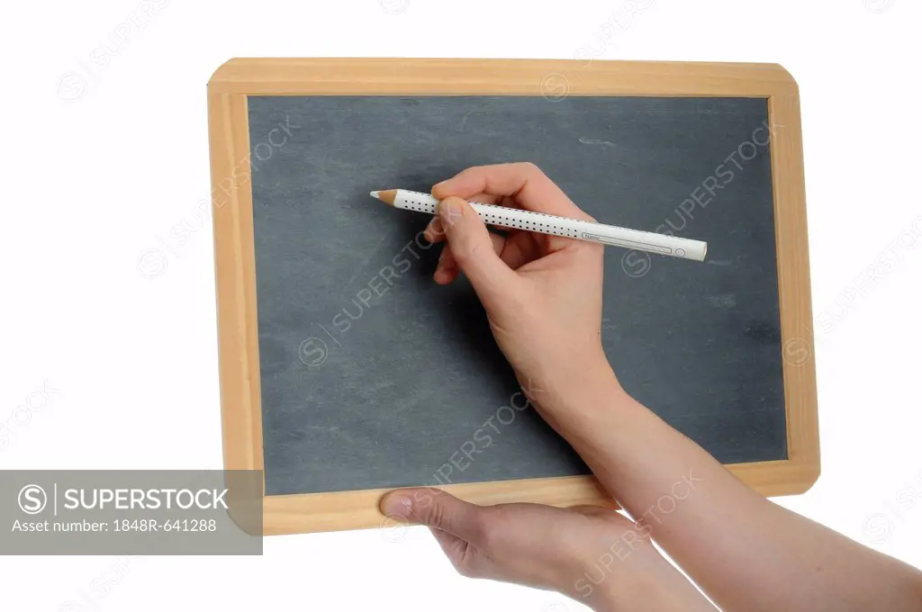 Woman's hand writing on a tablet, small blackboard