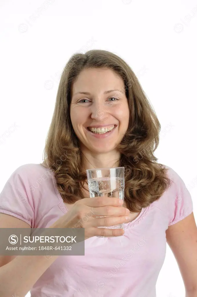 Young woman holding a glass of water