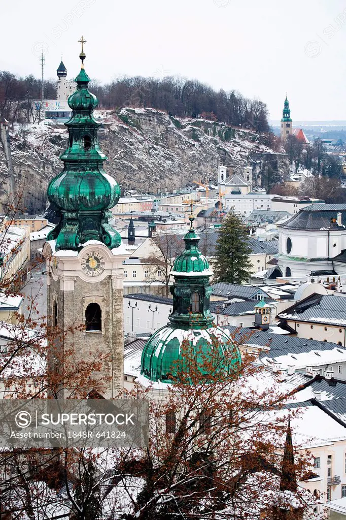 Overlooking the historic district of Salzburg with steeples of Kollegienkirche, collegiate church and Franziskanerkirche, Franciscan church, Austria, ...