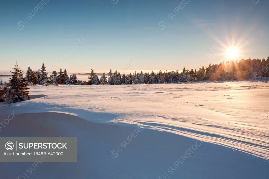 Winter landscape with sun in the northern Black Forest, Baden-Wuerttemberg, Germany, Europe