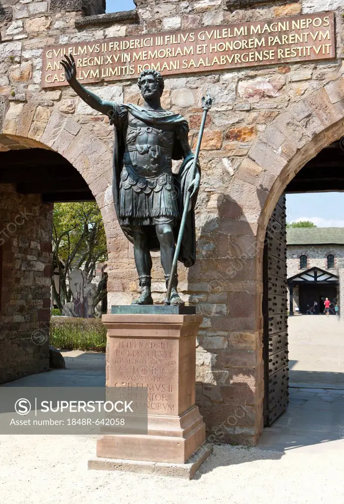 Bronze statue of the Roman emperor Augustus at the entrance of the reconstructed Saalburg Roman fort, Limes, UNESCO World Heritage Site, Taunus region...