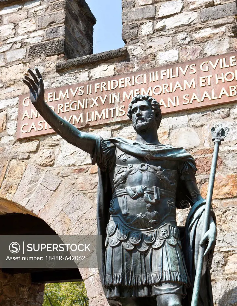 Bronze statue of the Roman emperor Augustus at the entrance of the reconstructed Saalburg Roman fort, Limes, UNESCO World Heritage Site, Taunus region...