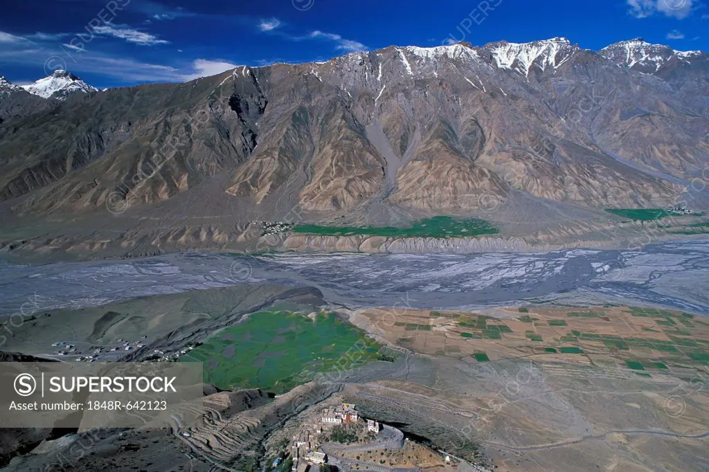View of fields and the Buddhist Ki or Key Monastery or Gompa, Spiti Valley, Lahaul and Spiti district, Indian Himalayas, Himachal Pradesh, North India...