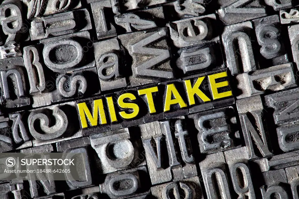 Old lead letters forming the word Mistake
