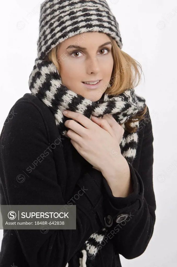 Woman wearing winter clothing, cold