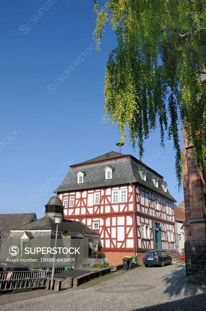 Oldest Town Hall and half-timbered building in the historic town centre of Biedenkopf, with the Wilden Mann or Hessenmann in the half-timbered buildin...