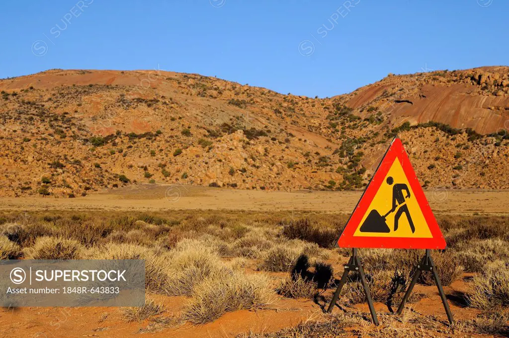 Warning sign for a construction site in the desert, Goegap Nature Reserve, Namaqualand, South Africa, Africa