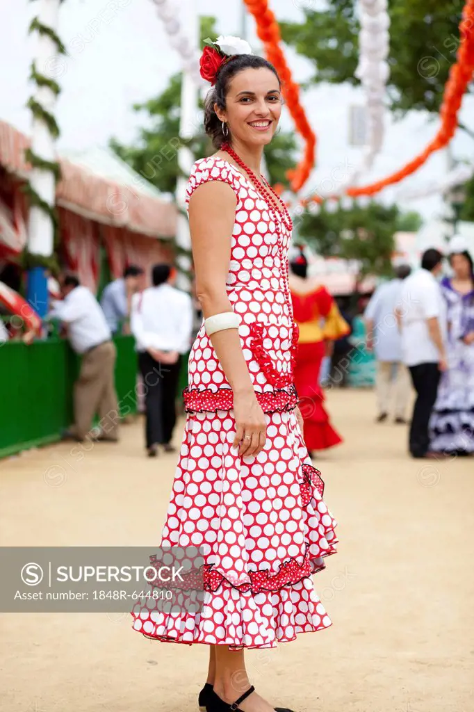 Woman wearing a traditional costume at the Feria de Abril, Seville April Fair, Seville, Spain, Europe