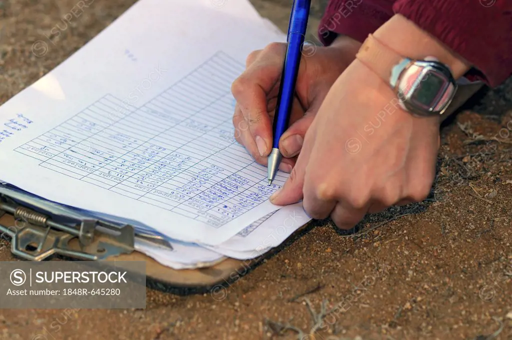 Data sheet being filled in with scientific data, Succulent Karoo Research Station in Goegap Nature Reserve, Namaqualand, South Africa, Africa