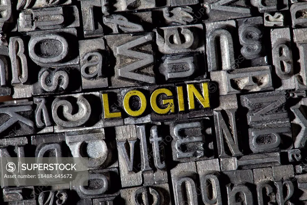 Old lead letters spelling the word LOGIN